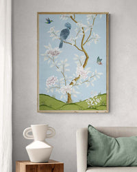 Blue botanical chinoiserie wall art print with flowers and birds in Chinese painting style on wall