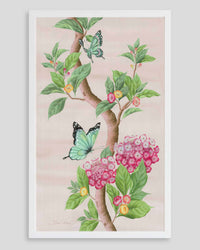 framed Chinoiserie style art print featuring butterflies and pink flowers on a pastel pink background