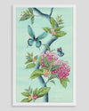 framed Chinoiserie style art print featuring butterflies and pink flowers on an aqua blue background