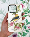 hand holding Luxury phone case featuring vintage style botanical bird on tree branch with flowers