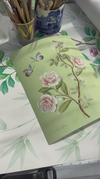 close up of green botanical chinoiserie wall art print featuring vintage style flowers and butterflies