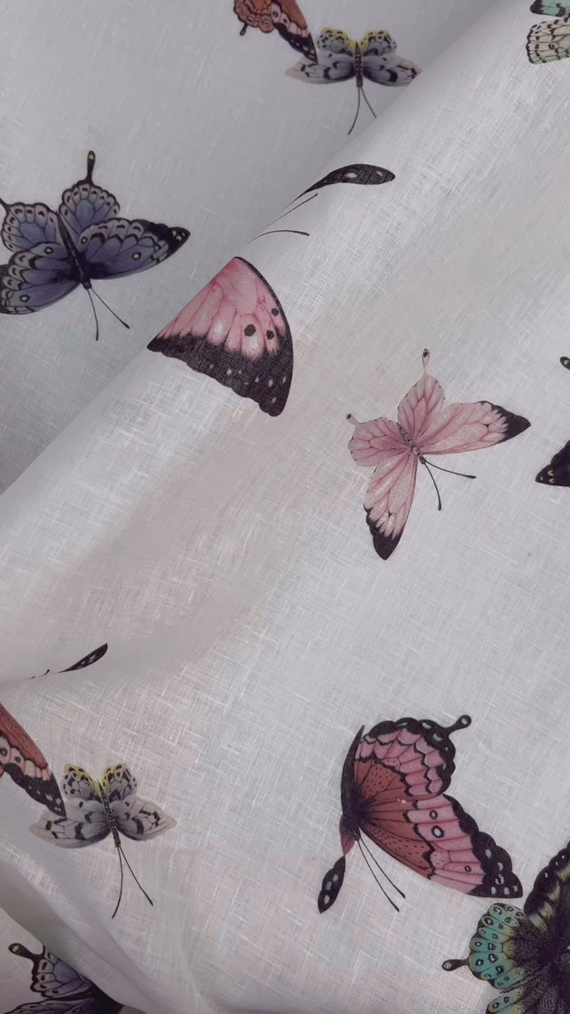 close up of botanical wallpaper featuring chinoiserie style butterflies