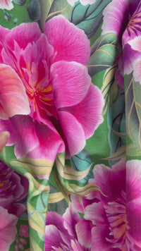 close up of green and pink floral chinoiserie fabric