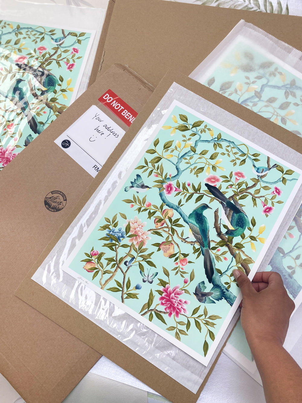 A chinoiserie art print by Diane Hill is packaged in sustainably sourced, recyclable packaging