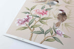 A close up of the printed signature which appears at the foot of the Bonnie art print. The Bonnie art print by Diane Hill features two little songbirds in conversation, perched amidst peonies and bamboo leaves, set against soft tones of pink and blush
