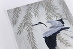 close up of Japanese-style chinoiserie wall art print featuring heron and wisteria on silver background