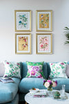 set of 4 colourful framed chinoiserie wall art print featuring vintage-style butterflies, blossoms, and flower branches displayed as gallery wall