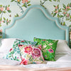 green chinoiserie fabric featuring bamboo and flowers on cushion in grandmillennial style bedroom