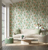 botanical wallpaper featuring chinoiserie style birds, branches, and butterflies in modern grandmillennial style living room