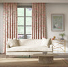 pink botanical fabric featuring chinoiserie style birds, branches, and butterflies on curtains in modern living room