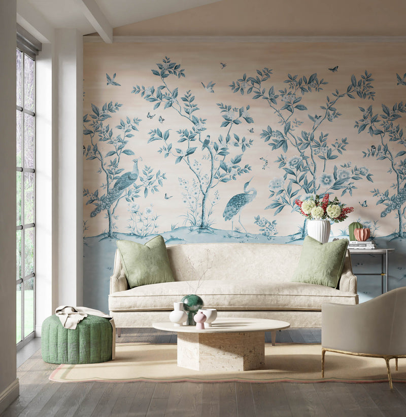 pink and blue classic chinoiserie wallpaper featuring chinese illustration style peacocks, birds, and botanicals in modern living room