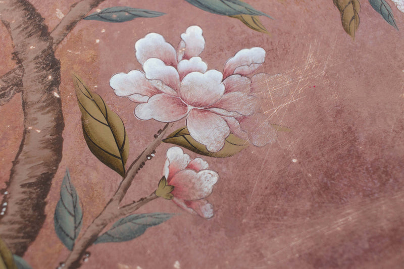 A close up shot of the distressed Chinoiserie art print, Alexandra. The original wallpaper panels were sanded back and distressed to create a beautiful aged look, which has rendered beautifully onto this earthy art print.