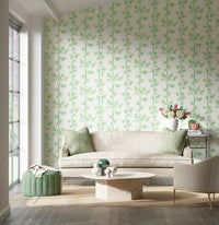 white and green botanical wallpaper featuring chinoiserie style bamboo in modern living room