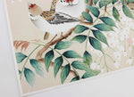 A close up of Diane Hill's chinoiserie art print, Katei. Featuring two birds and then green leaves of a wisteria tree.
