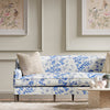 classic blue and white chinoiserie fabric featuring bamboo and flowers on sofa in modern living room