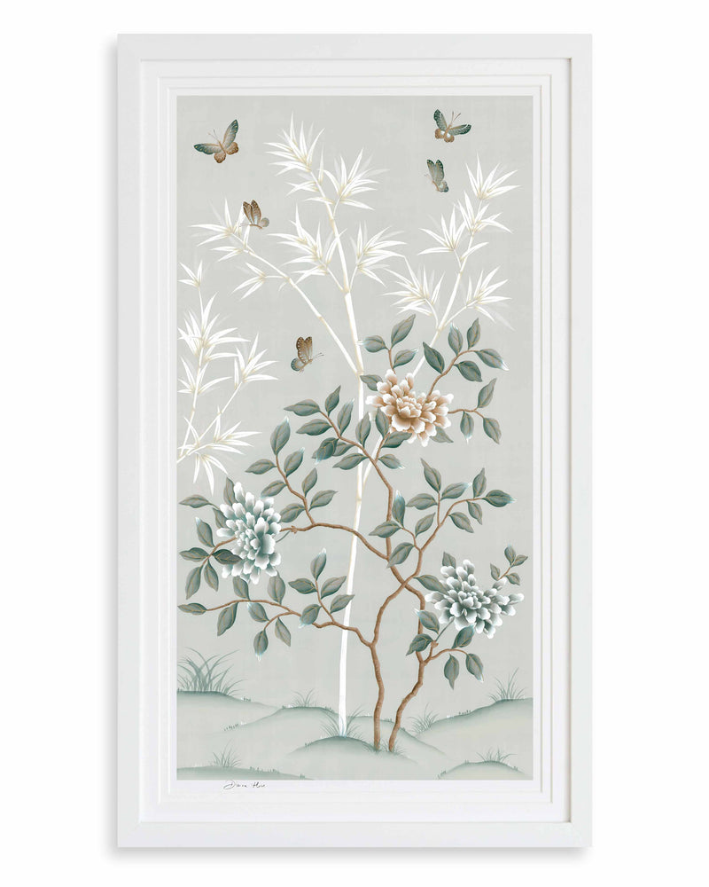 The Lilly art print in pebble blue, framed in a classic white frame. A celebration of butterflies, bamboo and botanicals, Lilly is a beautiful modern chinoiserie art print which was originally hand-painted onto pure silk, featuring delicate leaves and an abundance of butterflies  Edit alt text