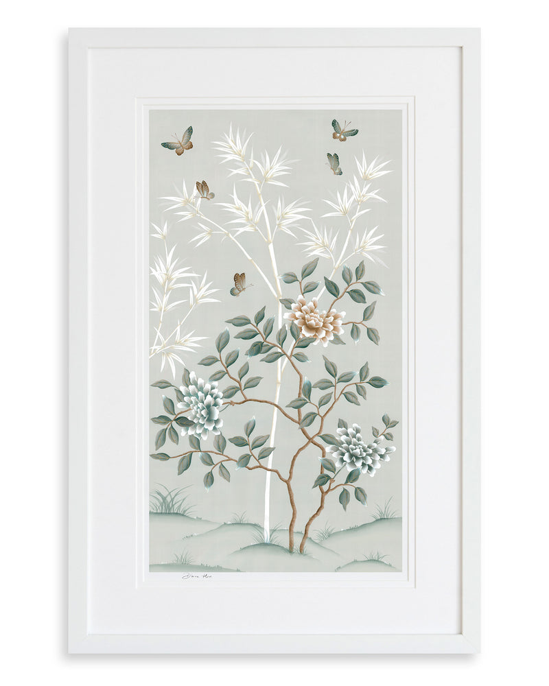 The Lilly art print in pebble blue, framed in a classic white frame. A celebration of butterflies, bamboo and botanicals, Lilly is a beautiful modern chinoiserie art print which was originally hand-painted onto pure silk, featuring delicate leaves and an abundance of butterflies
