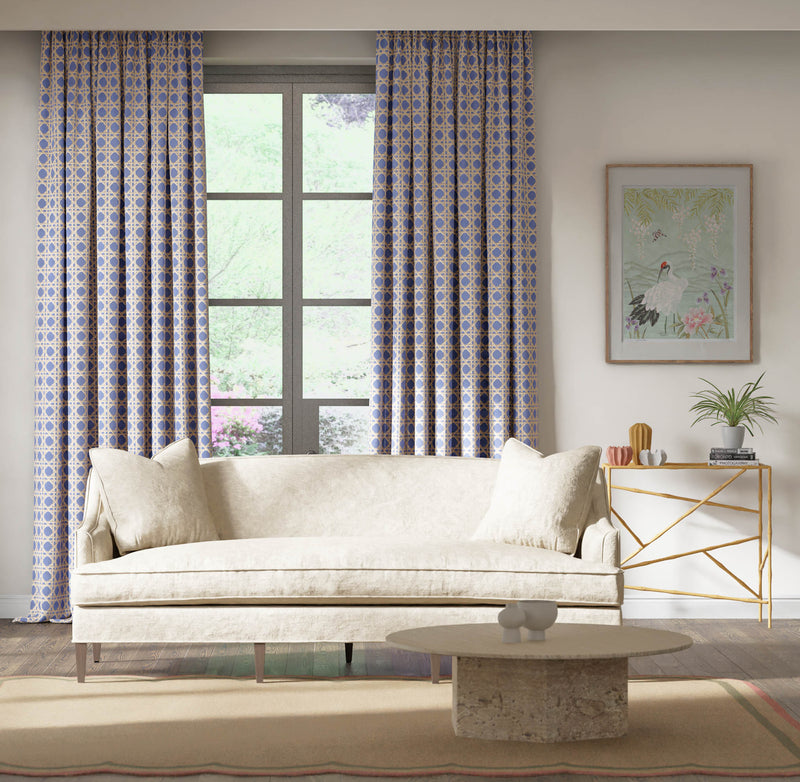 blue geometric fabric featuring chinoiserie trellis design on curtain in modern living room