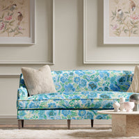 blue tonal floral chinoiserie fabric on sofa in modern living room