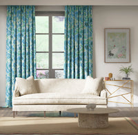 blue tonal floral chinoiserie fabric on curtains in modern living room