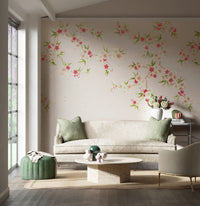 Pink chinoiserie wallpaper mural with light pink and white Japanese cherry blossom flowers in modern living room