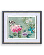 colourful framed chinoiserie wall art print featuring bird, flowers, and butterfly on blue background