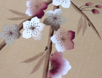 close up of chinoiserie wall art print featuring Japanese-style cherry blossom and branches in bronze, burgundy and white tones